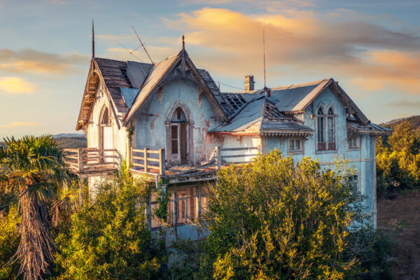 ..abandoned house on the top of a mountain in western europe -