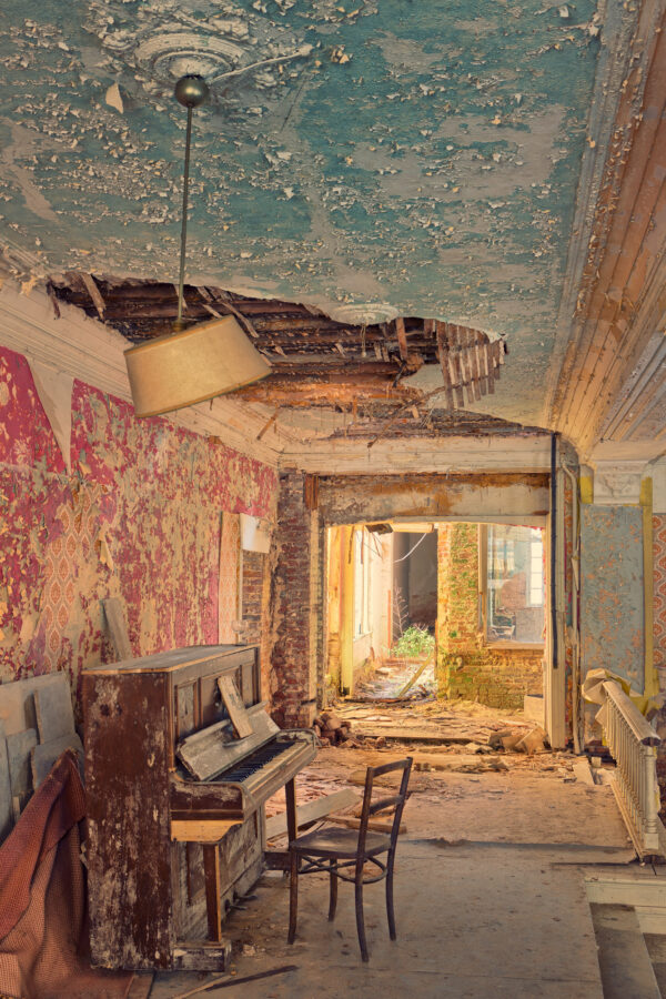 piano in an abandonded hotel -