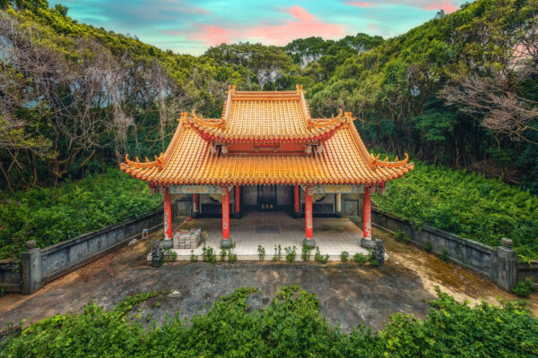 ..the golden splendour of a former religious centre in Taiwan contrasts with the surrounding nature, which is slowly reclaiming the building. -