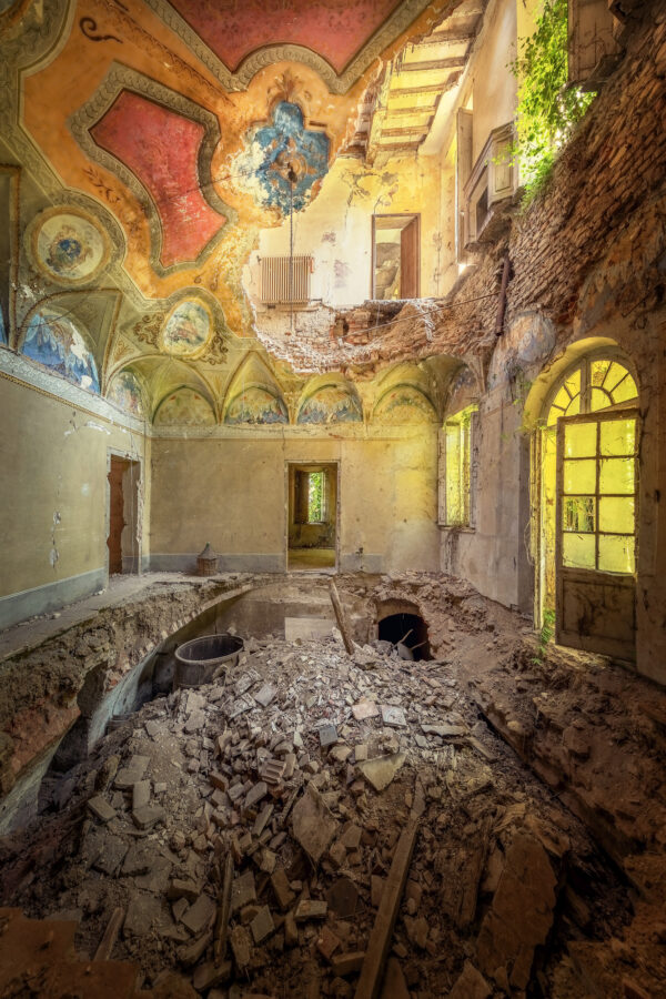 a tiny hall of an abandoned villa -