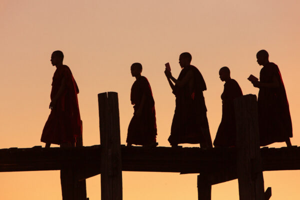 Monks on the U Bein Bridge in Myanmar -