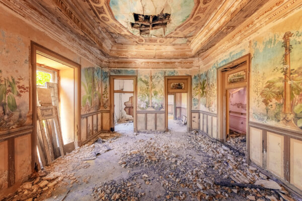 a beautifully painted room in an old burnt-out palace -