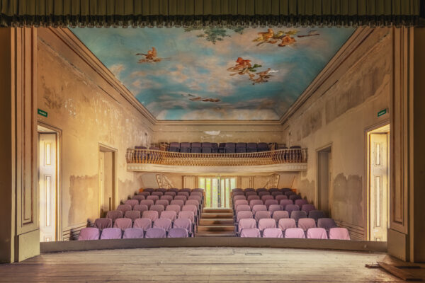a small stage inside of an abandoned palace -