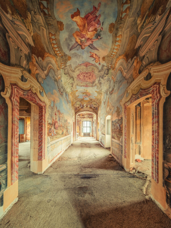 the guardian watches over this grand, decaying Baroque hall. -