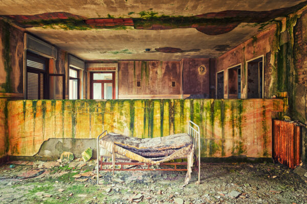 bedroom in an abandoned hospital.. -