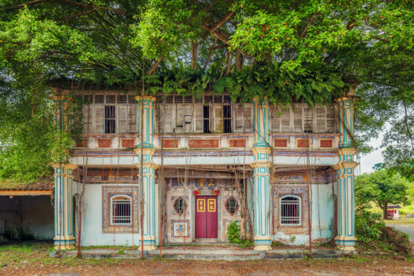 Once the grand home of a Chinese sugar cane manufacturer, this historic mansion now stands in silent repose, gracefully enveloped by nature. -
