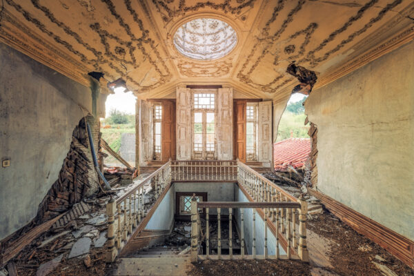 ...the structure still stands, but barely. A fragile skeleton of former glory. Nature and neglect have taken their toll. -