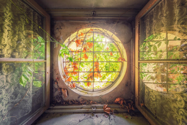 a small inconspicuous window in an abandoned villa -