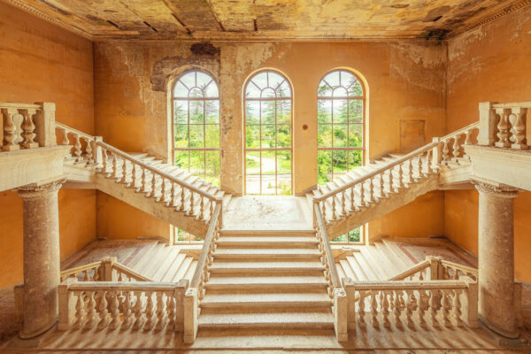 the grand staircase of an abandoned sanatorium in a spa resort in the former Soviet Union -