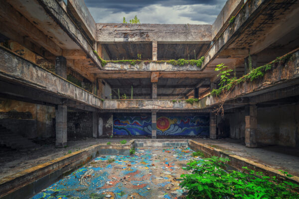 an abandoned indoor swimming pool in a former Soviet republic -