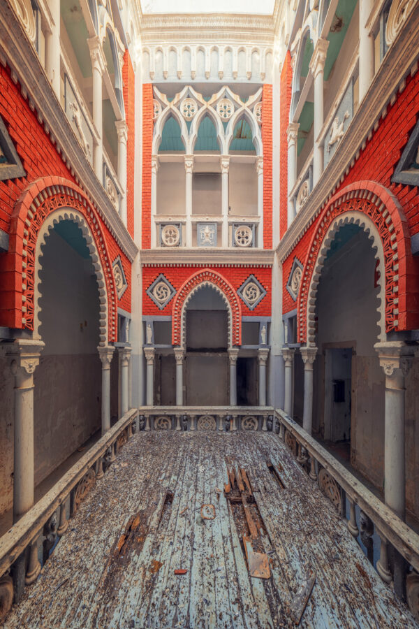 ..once a grand hotel, now a silent relic where dust and time quietly reclaim every corner." -