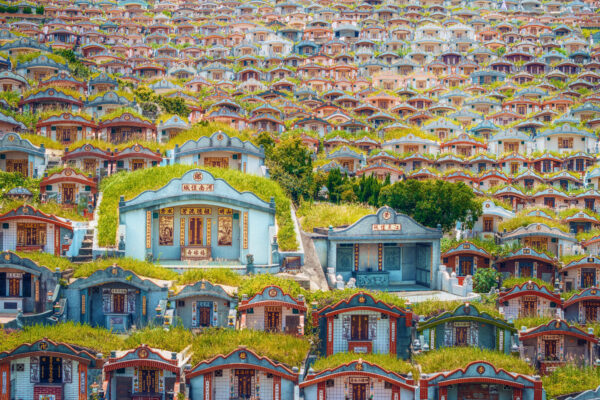 ...layers of ancestral tombs create a striking mosaic across the Taiwanese hillside.