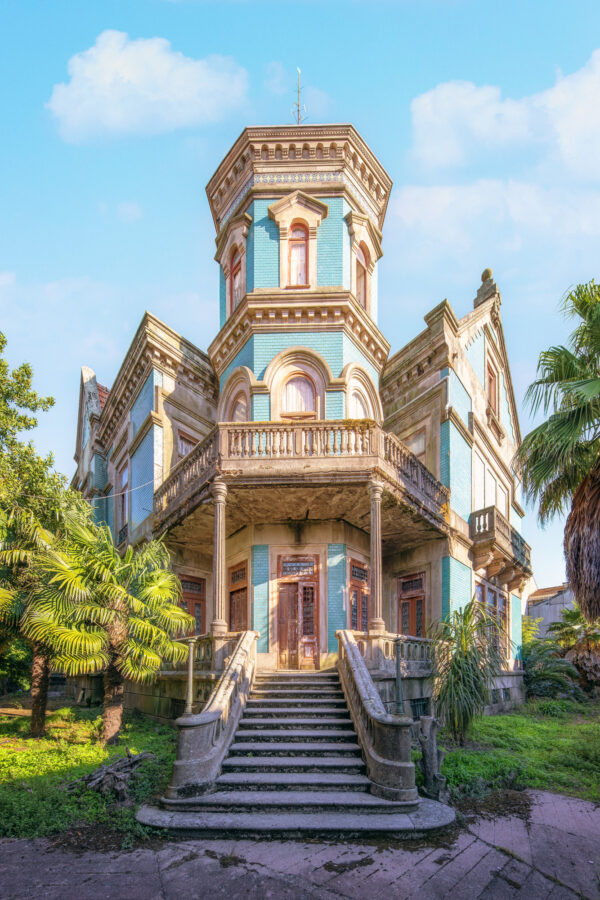 ..standing before this manor, the echoes of former glory are still visible in its proud, weathered architecture.