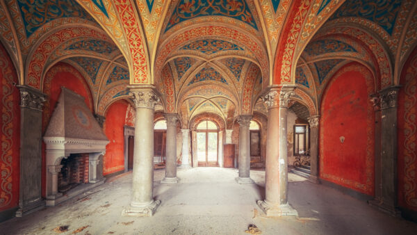 Sturdy pillars support the magnificent weight of a domed hall hidden above.