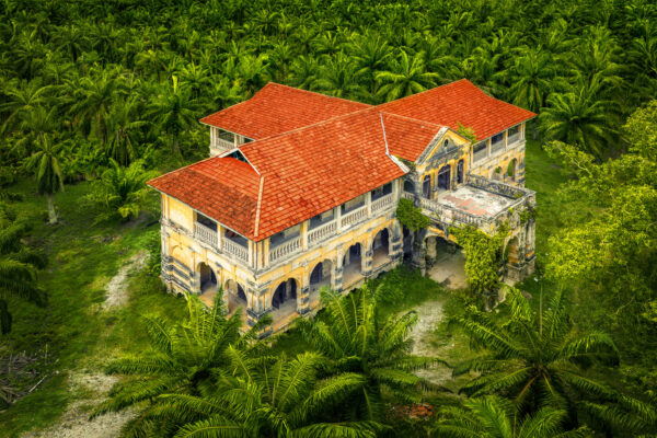 ..surrounded by palms, the Caledonia Mansion remains a quiet witness to Malaysia’s colonial past.